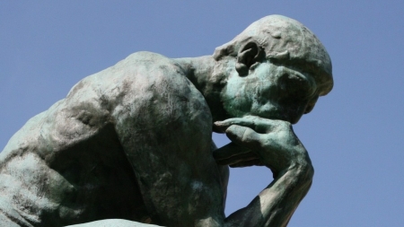 image of the thinker statue posed